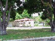 House on corner of Calle 3 & Calle Principal occupied at various times by the Thomas Wall & family, Edmundo Cintra & family and Bob Louis & family.